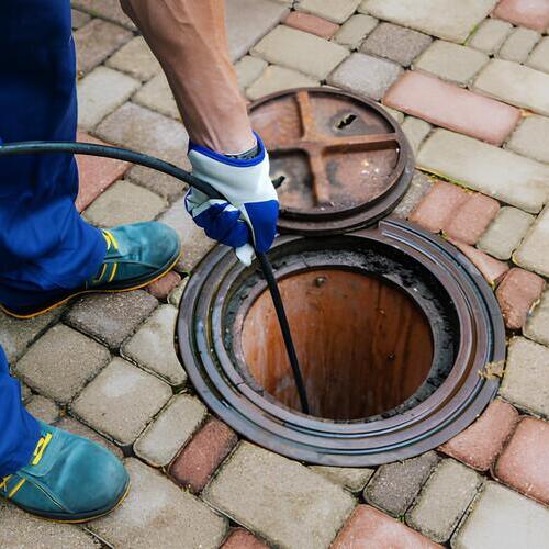 plumber providing hydro jetting