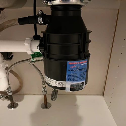 garbage disposal under a sink